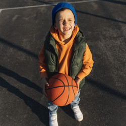 close-up-little-boy-playing-basketball